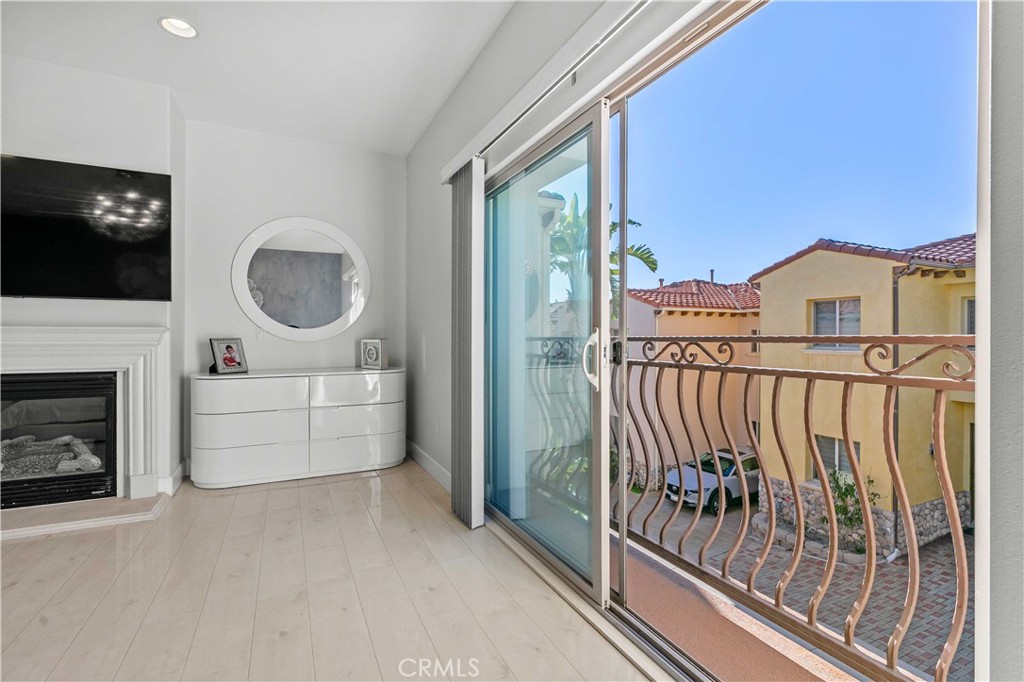 6920 Valmont Street, Unit 5 Tujunga, CA 91042 - Photo 53 of 69 a view of a livingroom with furniture and fireplace