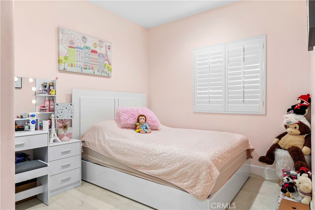6920 Valmont Street, Unit 5 Tujunga, CA 91042 - Photo 56 of 69 a bedroom with a bed and a window