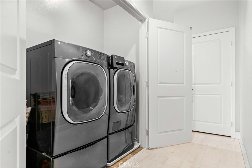 6920 Valmont Street, Unit 5 Tujunga, CA 91042 - Photo 61 of 69 a utility room with dryer and washer