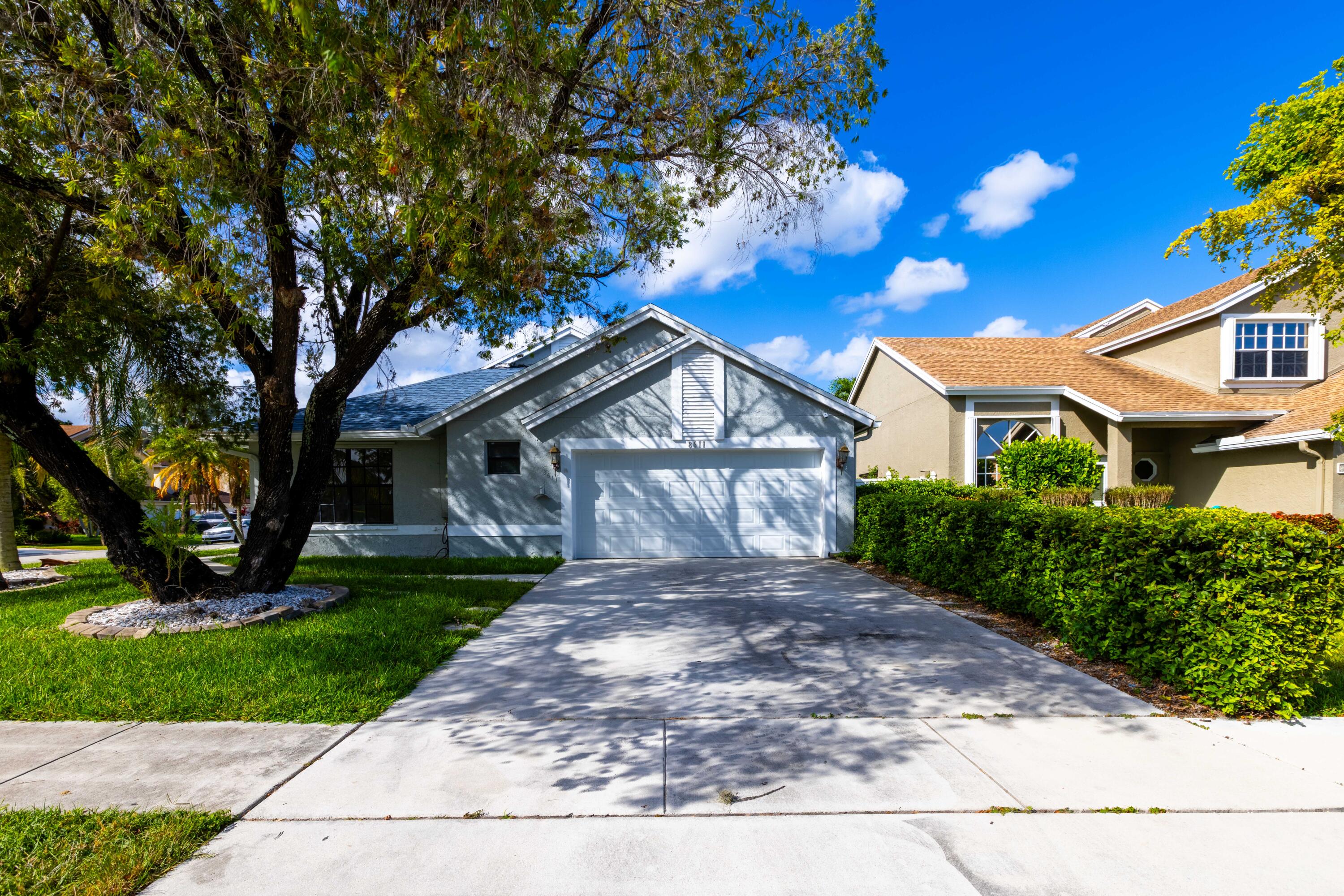 8611 Old Towne Way Boca Raton, FL 33433 - Photo 3 of 38 Front