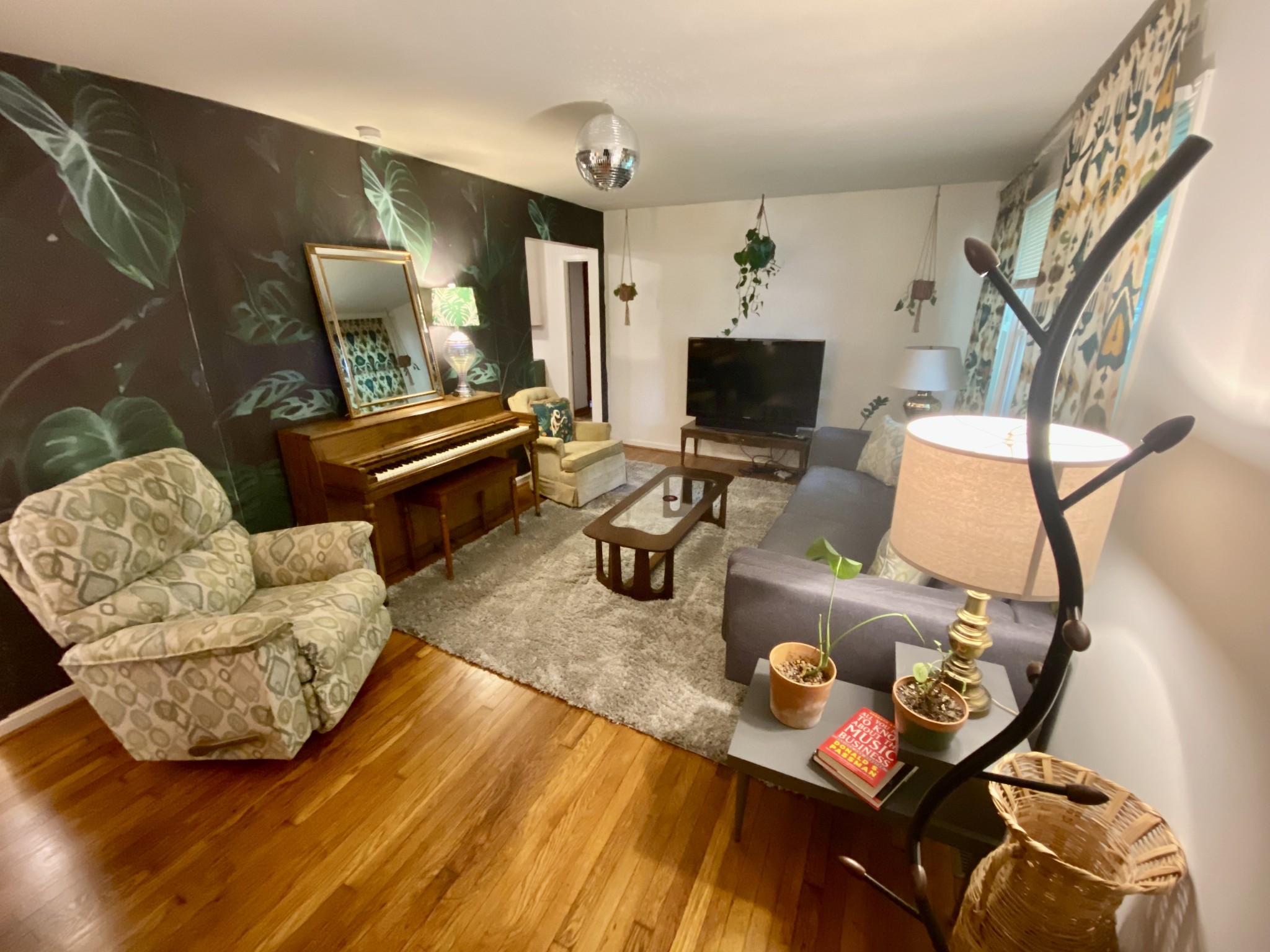 827 Wren Road Goodlettsville, TN 37072 - Photo 4 of 17 a living room with furniture and a flat screen tv