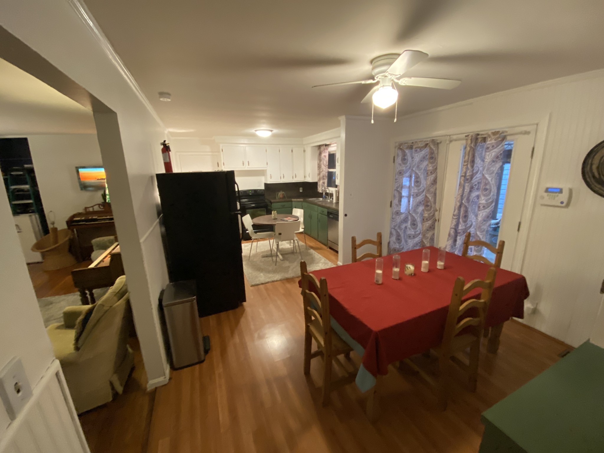 827 Wren Road Goodlettsville, TN 37072 - Photo 6 of 17 a living room with furniture a flat screen tv and a refrigerator