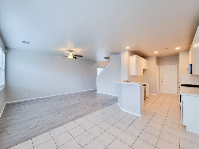 a view of a kitchen with a sink