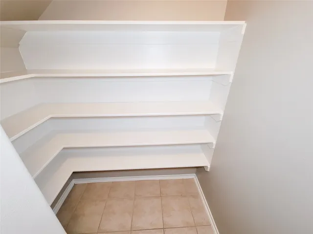 a view of small space with racks on the wall