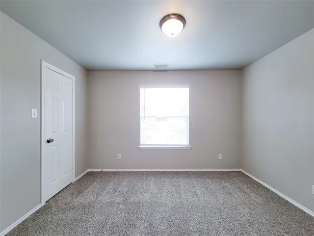 a view of small space with racks on the wall