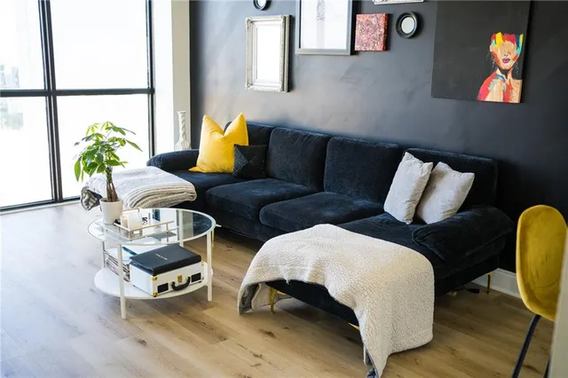 a living room with furniture and a window