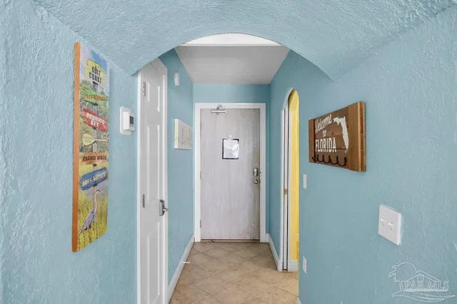 a view of a hallway with entryway