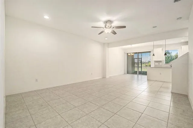 a view of a livingroom with a kitchen