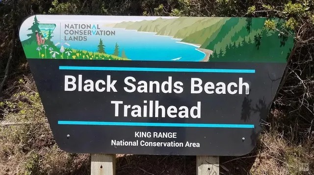 a view of a balcony with an ocean