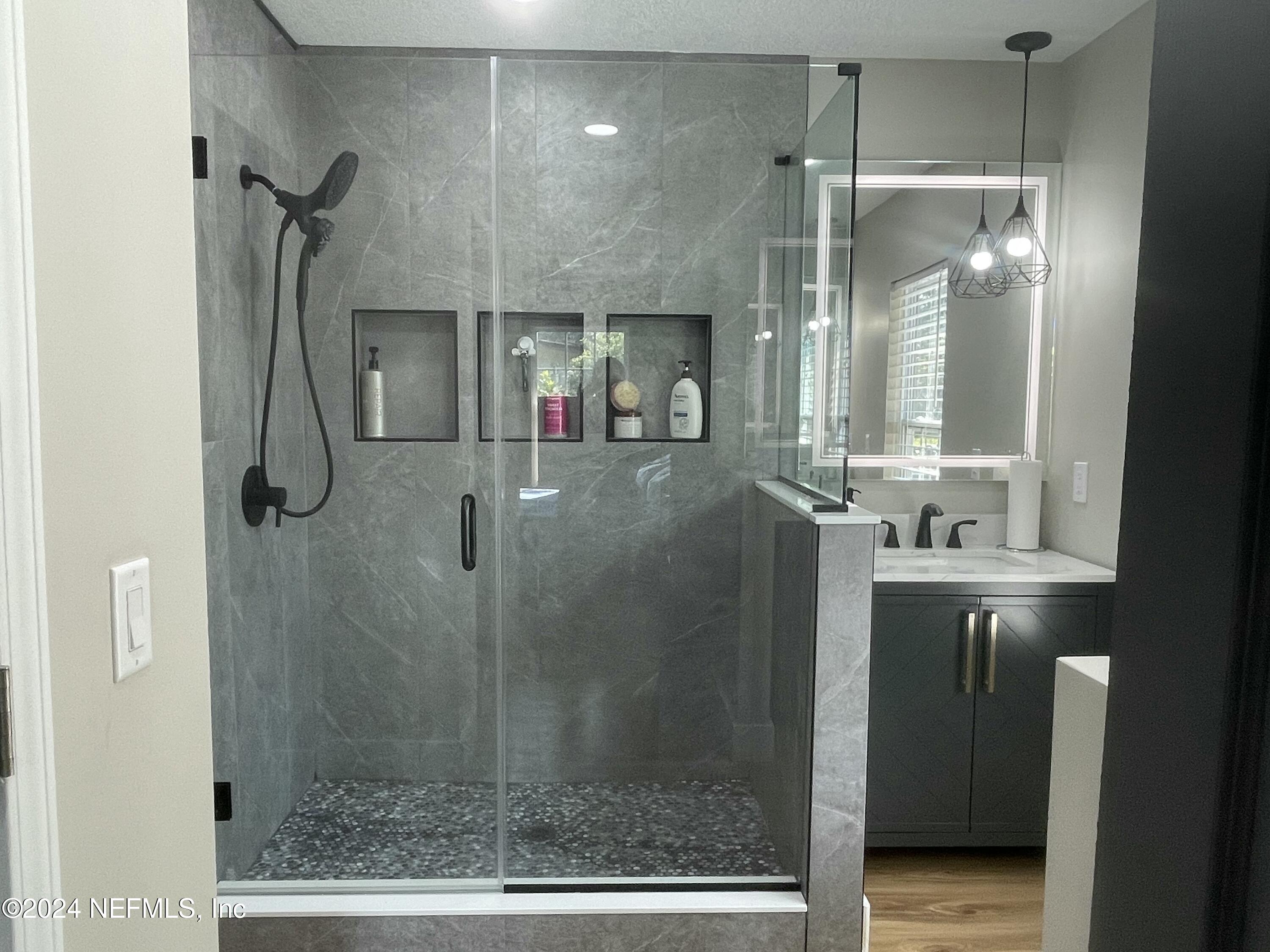 7566 Old Kings Road South Jacksonville, FL 32217 - Photo 15 of 30 a bathroom with a shower