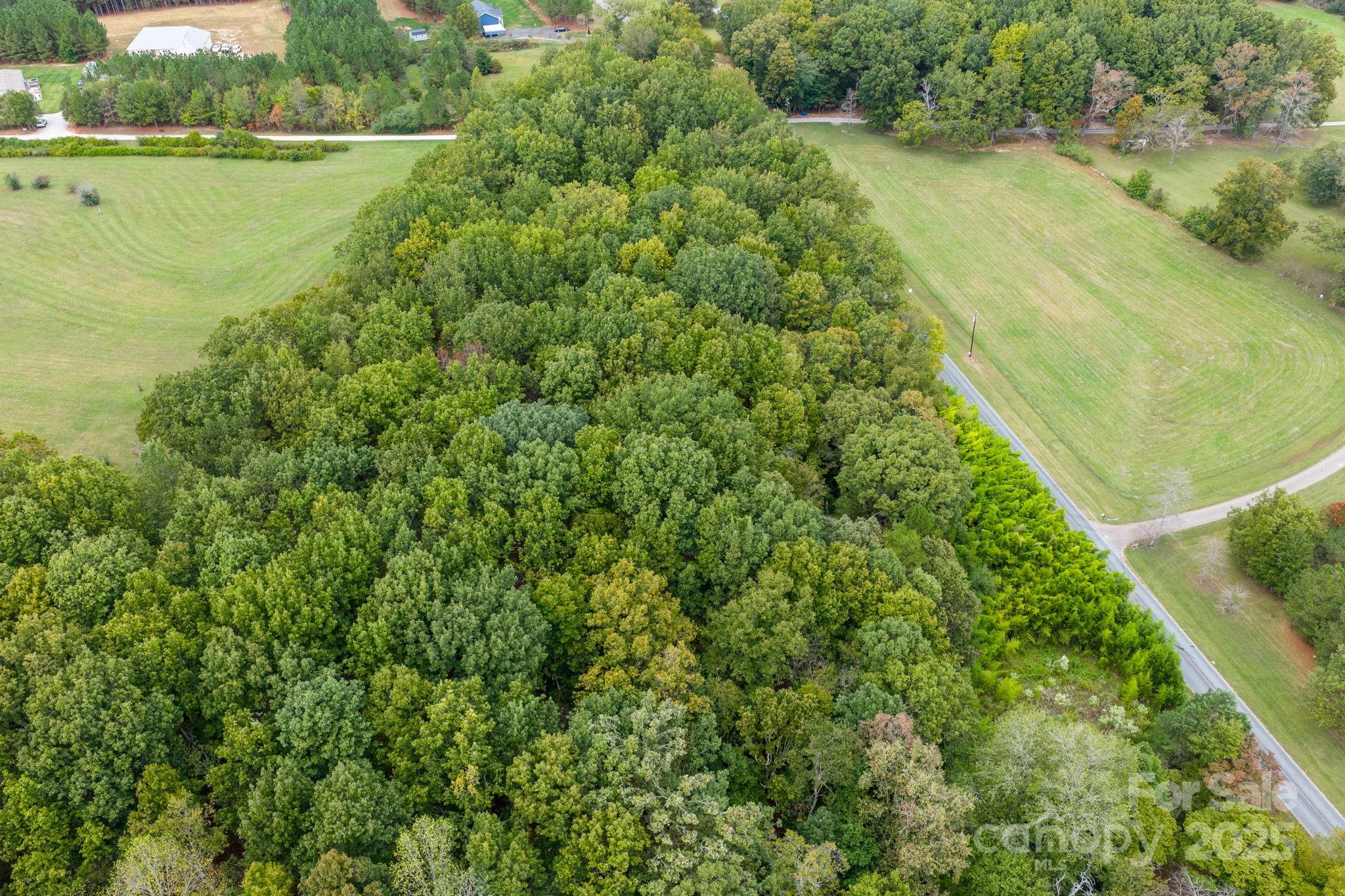 1615 Fox Dairy Road, Unit 12 Newton, NC 28658 - Photo 12 of 35 a view of a lake with a yard
