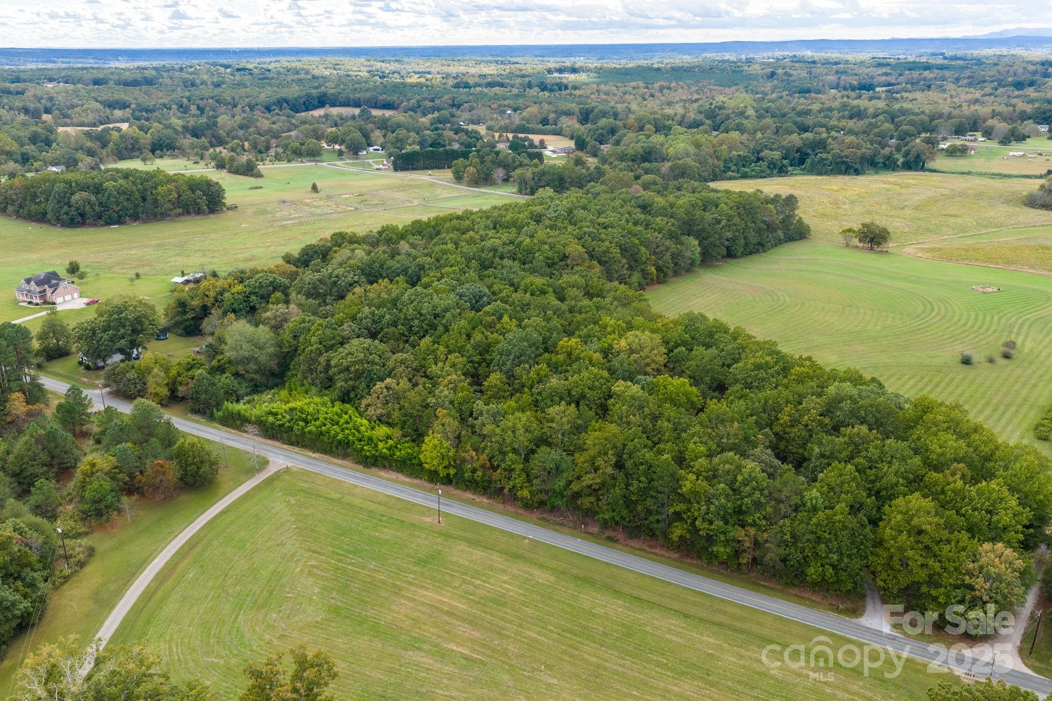 1615 Fox Dairy Road, Unit 12 Newton, NC 28658 - Photo 15 of 35 a view of a field with an ocean