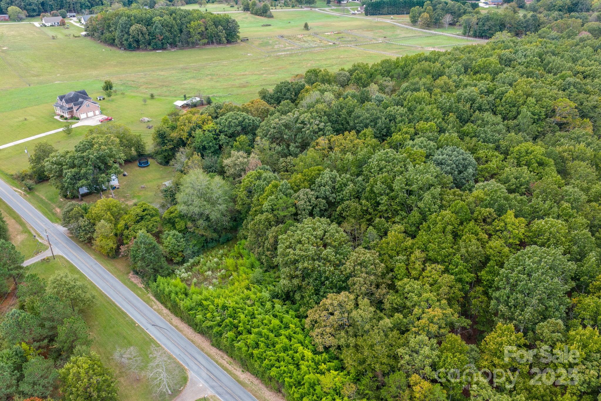 1615 Fox Dairy Road, Unit 12 Newton, NC 28658 - Photo 25 of 35 a view of a green yard with an outdoor seating