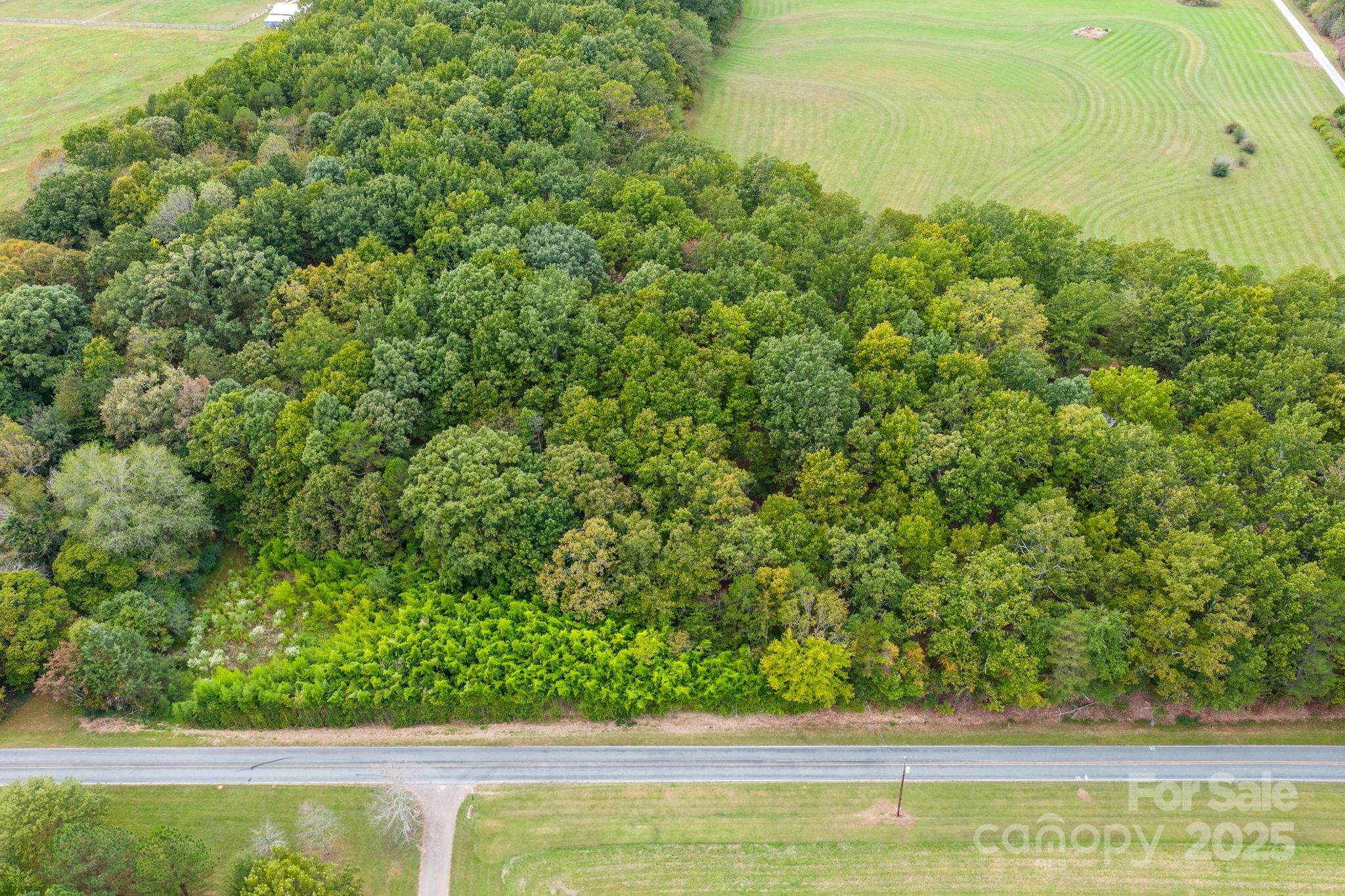 1615 Fox Dairy Road, Unit 12 Newton, NC 28658 - Photo 8 of 35 a view of a yard with an outdoor space