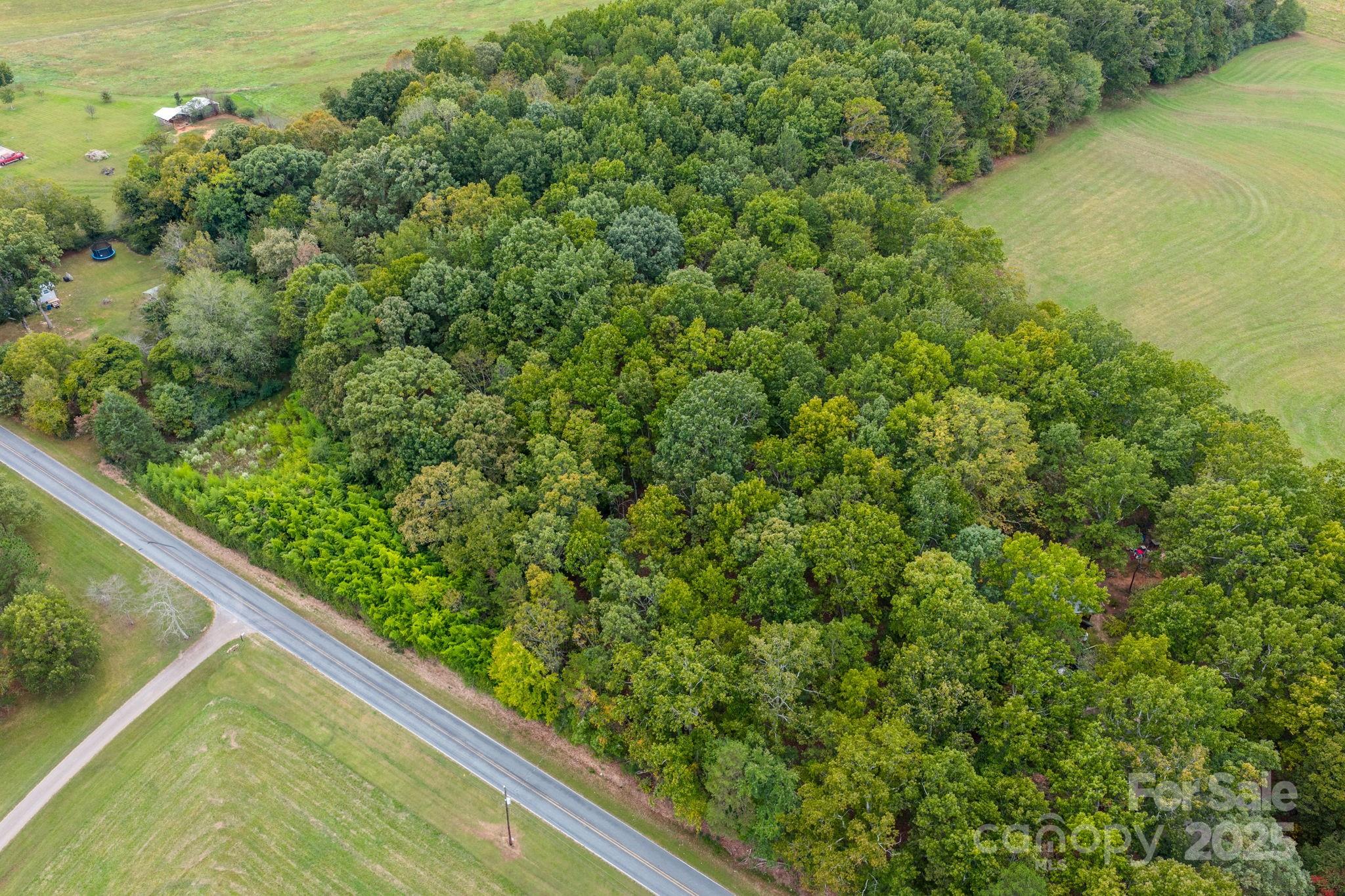 1615 Fox Dairy Road, Unit 12 Newton, NC 28658 - Photo 9 of 35 a view of a garden from a balcony