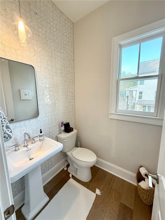 2098 Cortland Road, Unit 31 Alpharetta, GA 30004 - Photo 11 of 16 a bathroom with a toilet sink and mirror