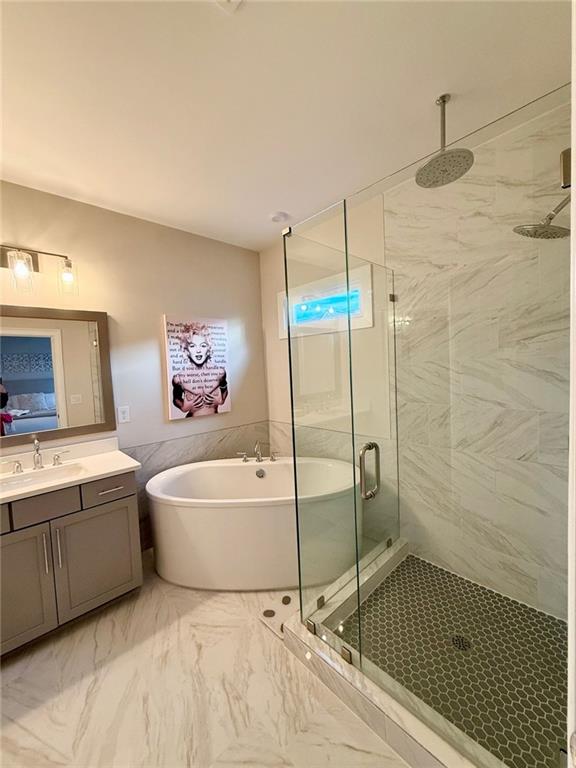2098 Cortland Road, Unit 31 Alpharetta, GA 30004 - Photo 13 of 16 a bathroom with a bathtub and a shower