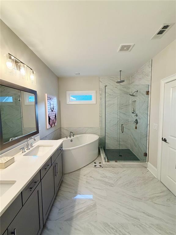 2098 Cortland Road, Unit 31 Alpharetta, GA 30004 - Photo 14 of 16 a spacious bathroom with a granite countertop tub sink shower and mirror