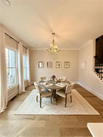a kitchen with stainless steel appliances kitchen island wooden cabinets and stove