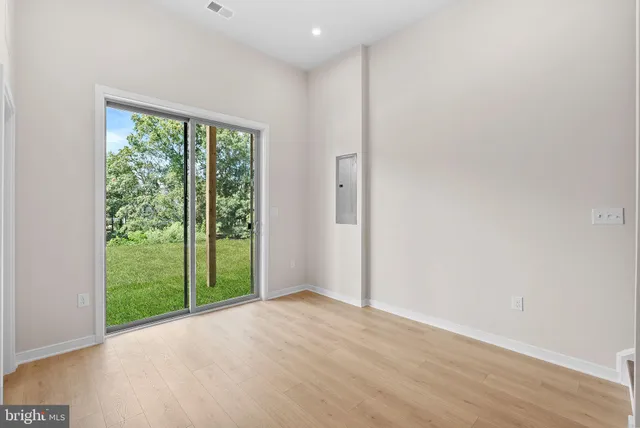 an empty room with windows