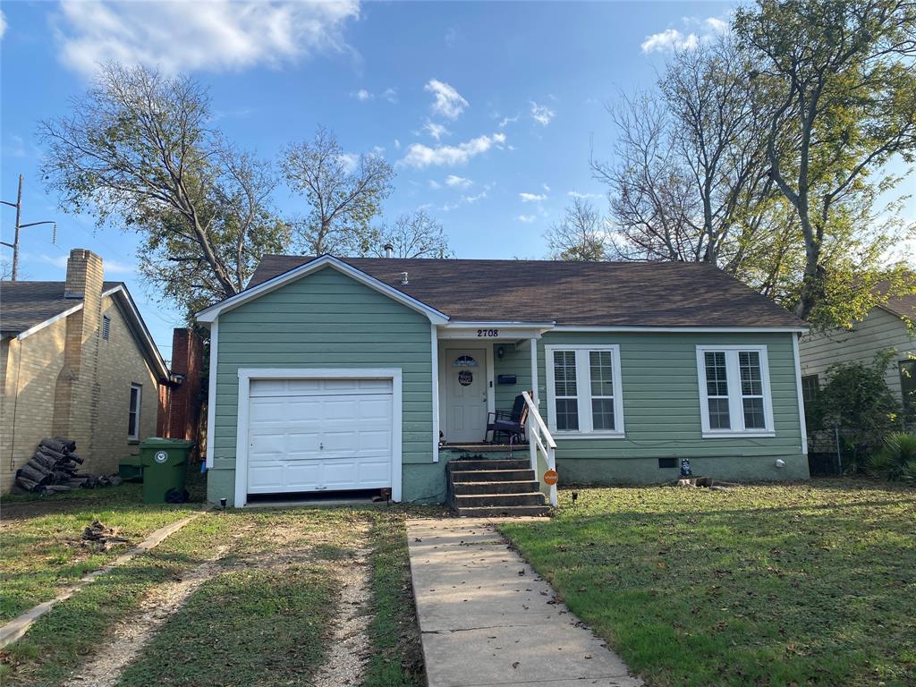 View of front of home featuring crawl space, a front lawn, and covered porch