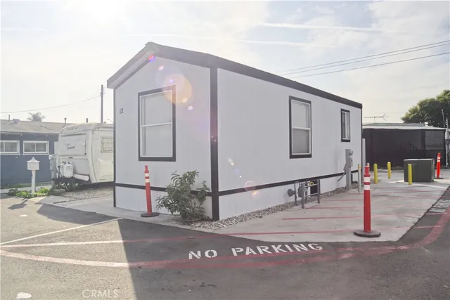 a front view of a house with street