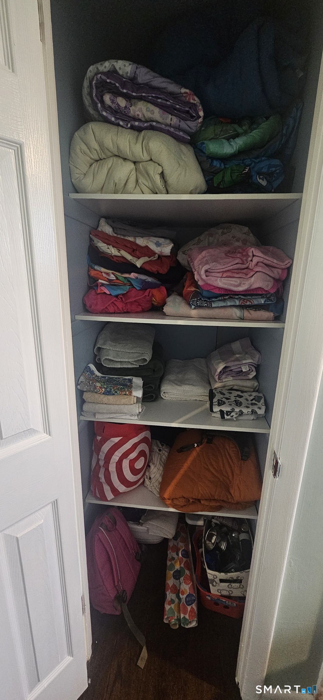 60 Nod Road Windsor, CT 06095 - Photo 18 of 38 a utility room with lots of different colored cloths