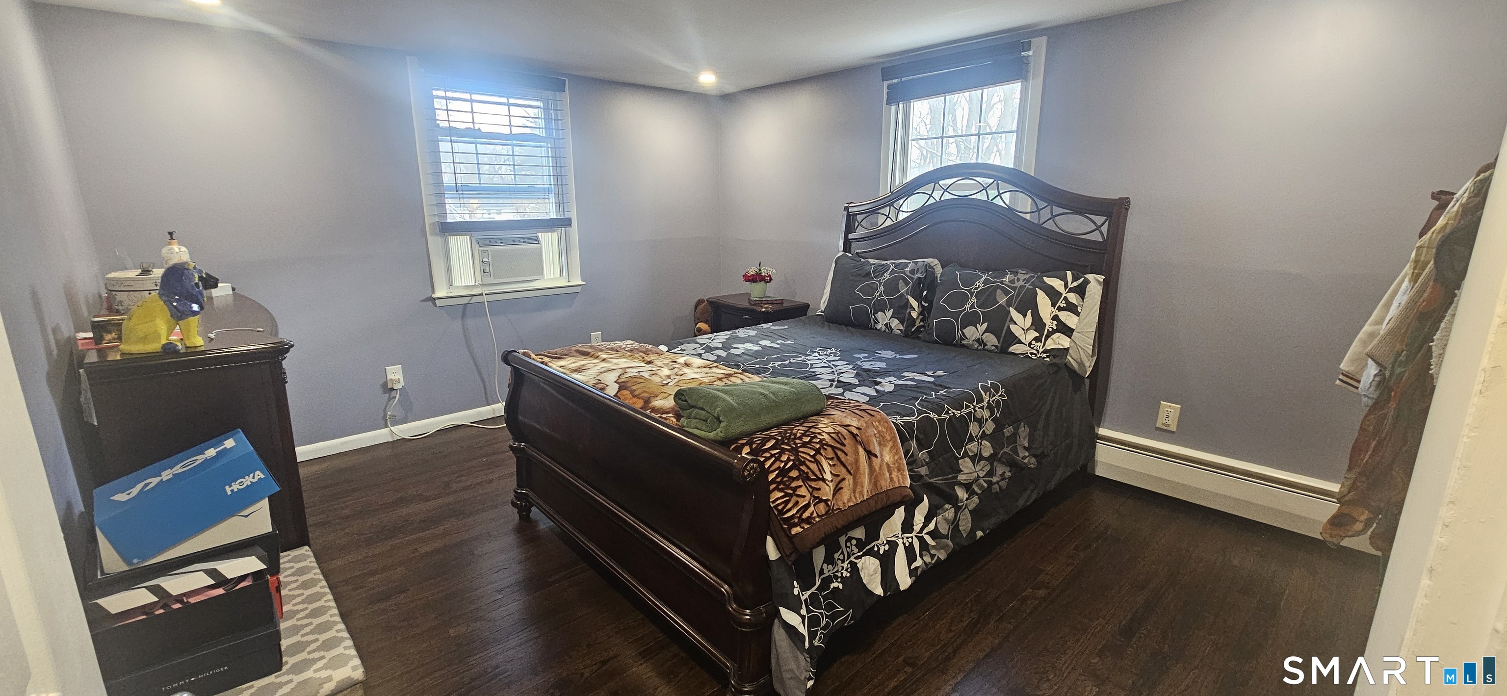 60 Nod Road Windsor, CT 06095 - Photo 19 of 38 a bed sitting in a bedroom next to a window