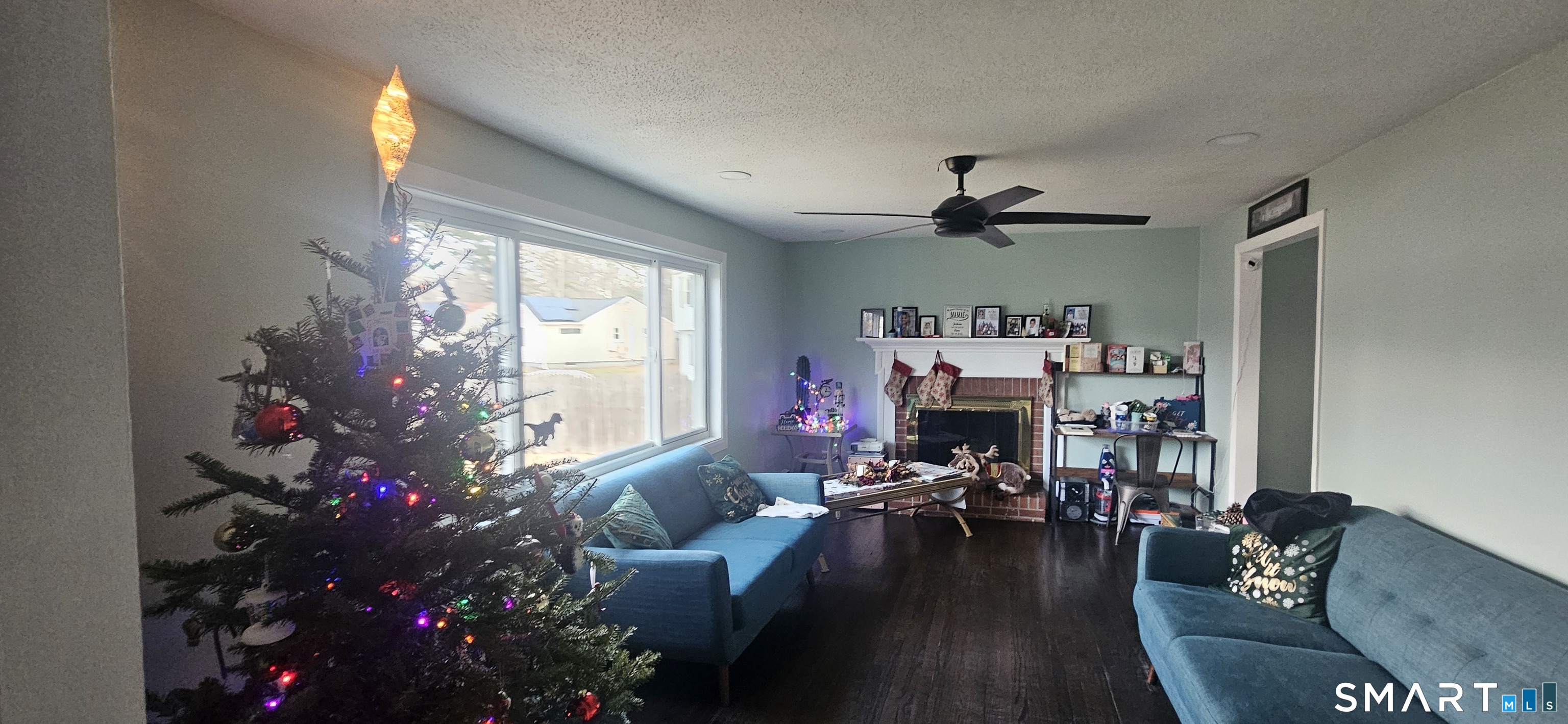 60 Nod Road Windsor, CT 06095 - Photo 3 of 38 a living room with furniture and a large window or chandelier