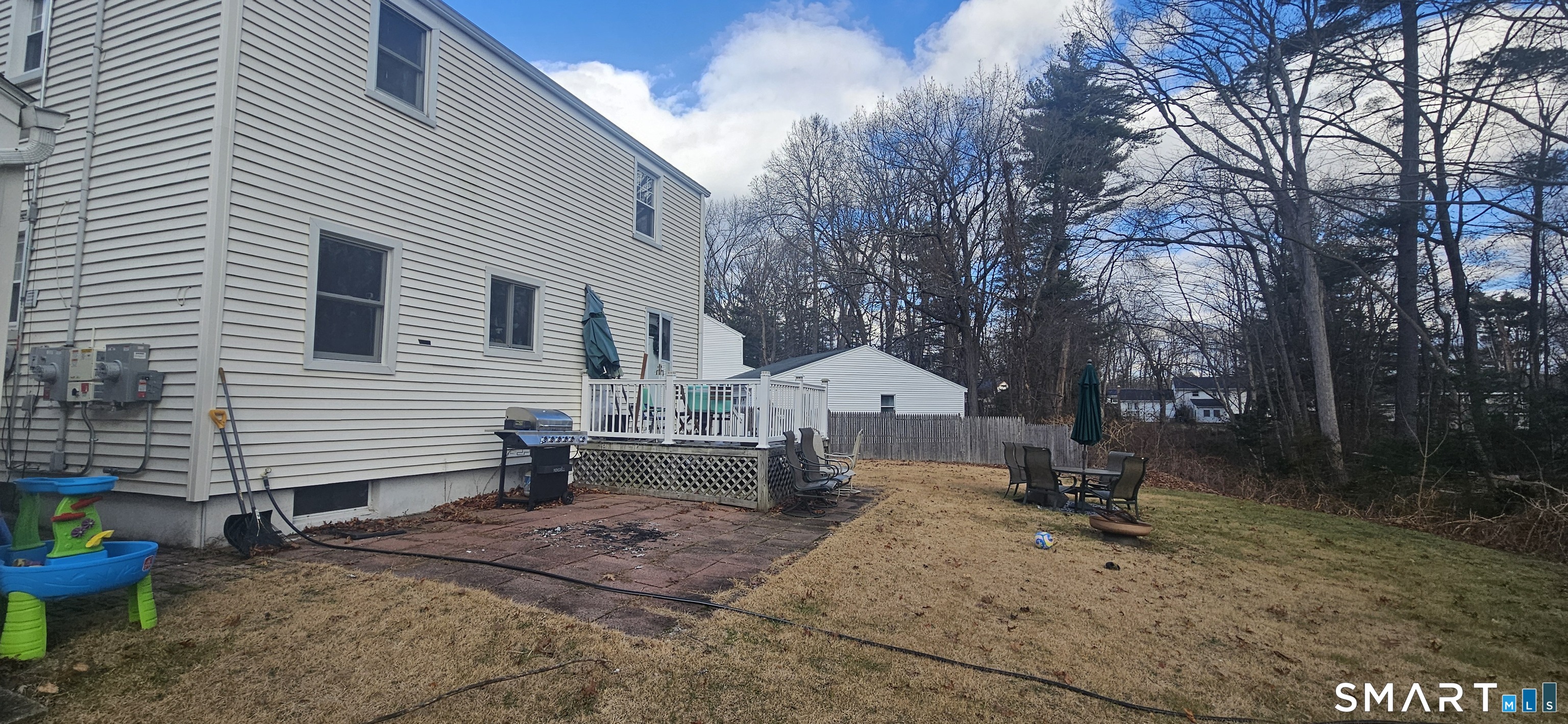 60 Nod Road Windsor, CT 06095 - Photo 38 of 38 a view of a house with backyard and chairs