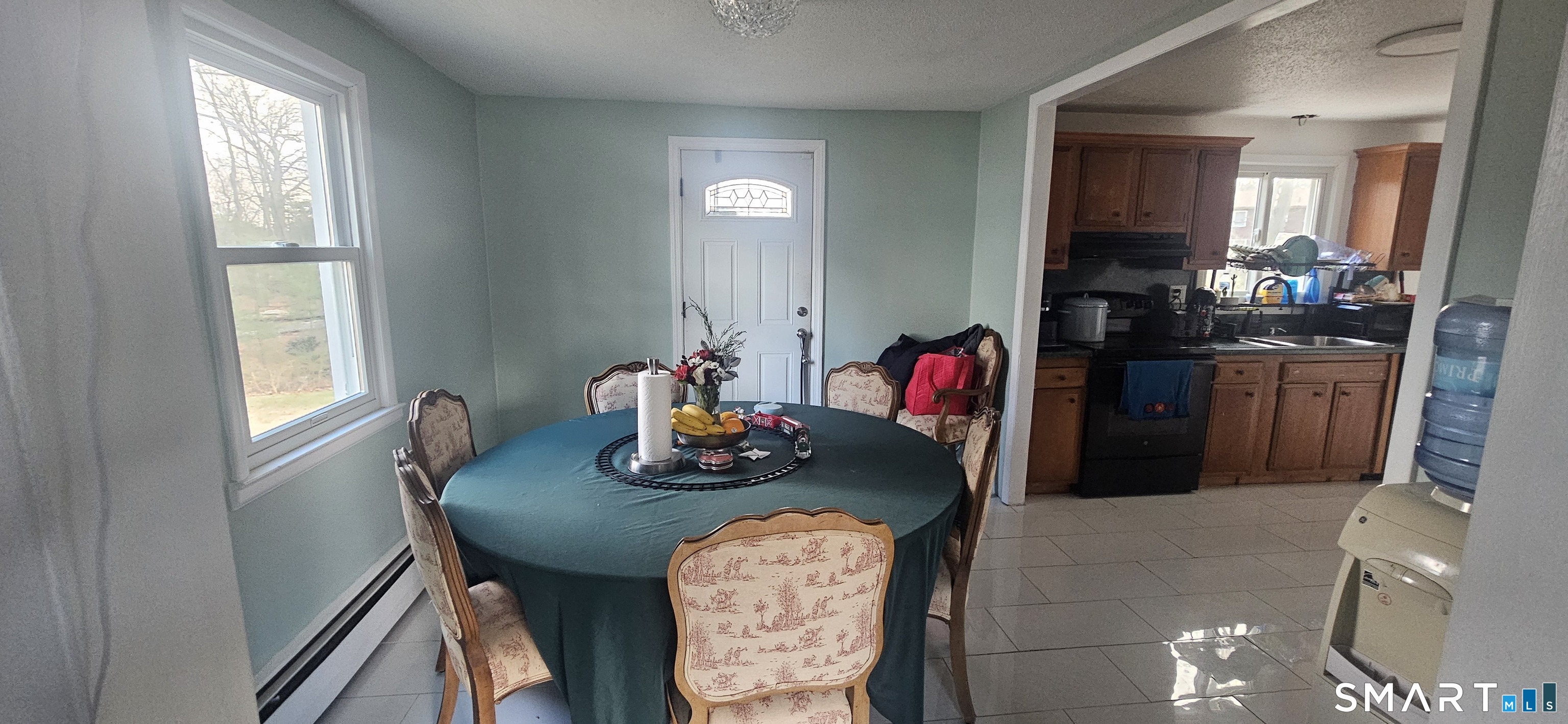 60 Nod Road Windsor, CT 06095 - Photo 10 of 38 a bathroom with a granite countertop sink a mirror and a window