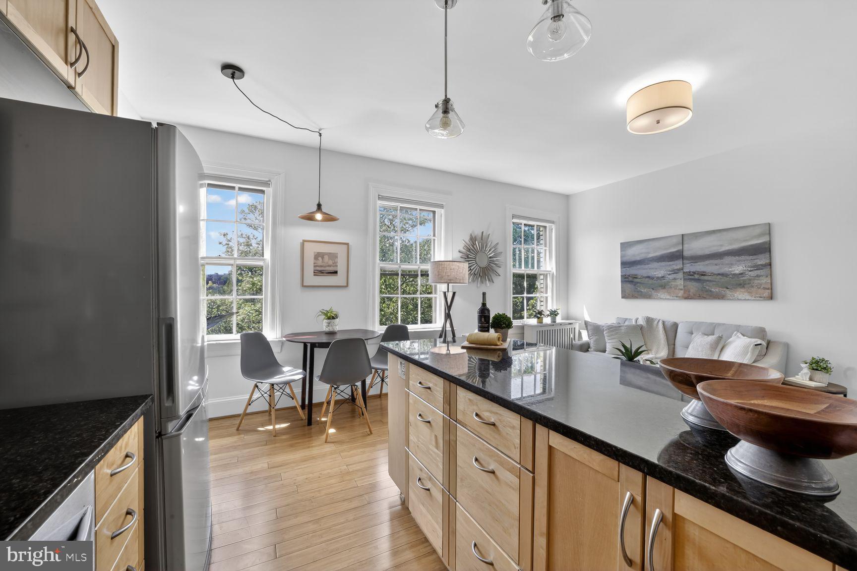 2707 Adams Mill Road Northwest, Unit 400 Washington, DC 20009 - Photo 14 of 21 Bright and airy modern kitchen space.