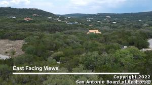 1732 Private Road 1732 Road Mico, TX 78056 - Photo 4 of 7 View of mountain backdrop featuring a heavily wooded area