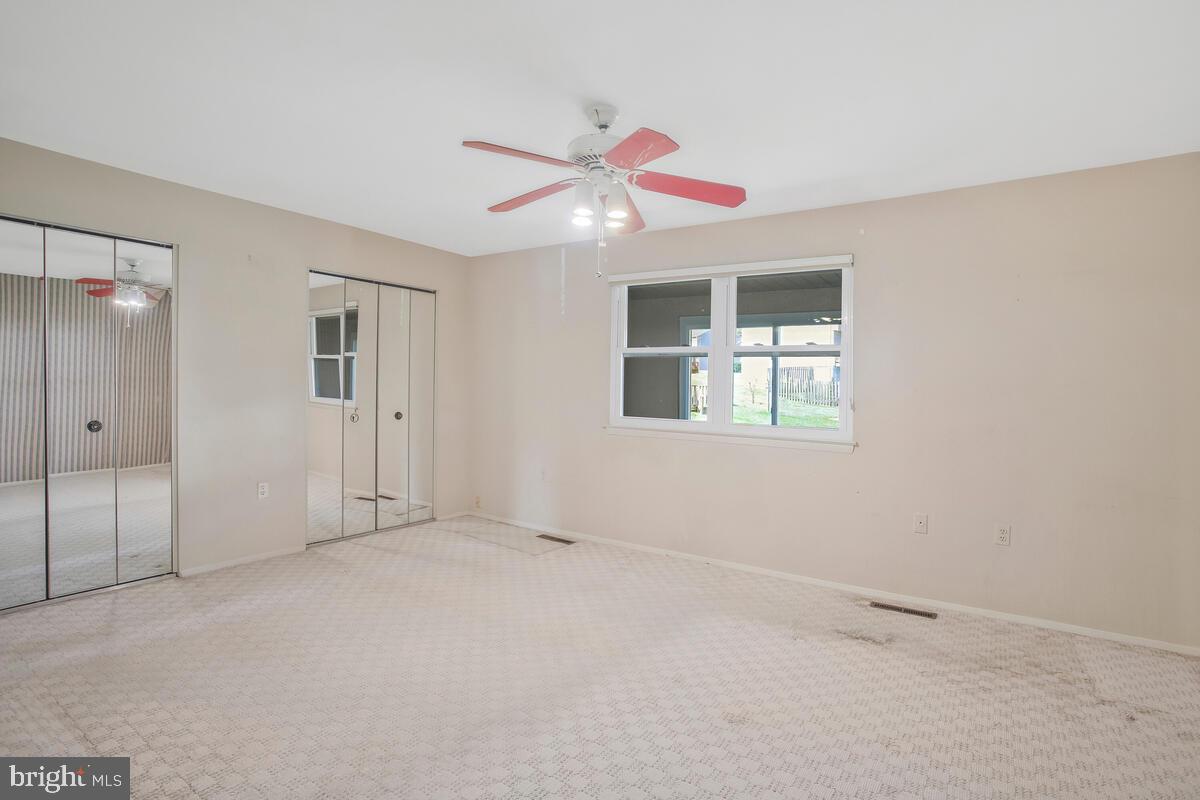 9930 Tuscarora Road Randallstown, MD 21133 - Photo 15 of 35 Primary bedroom with view out back