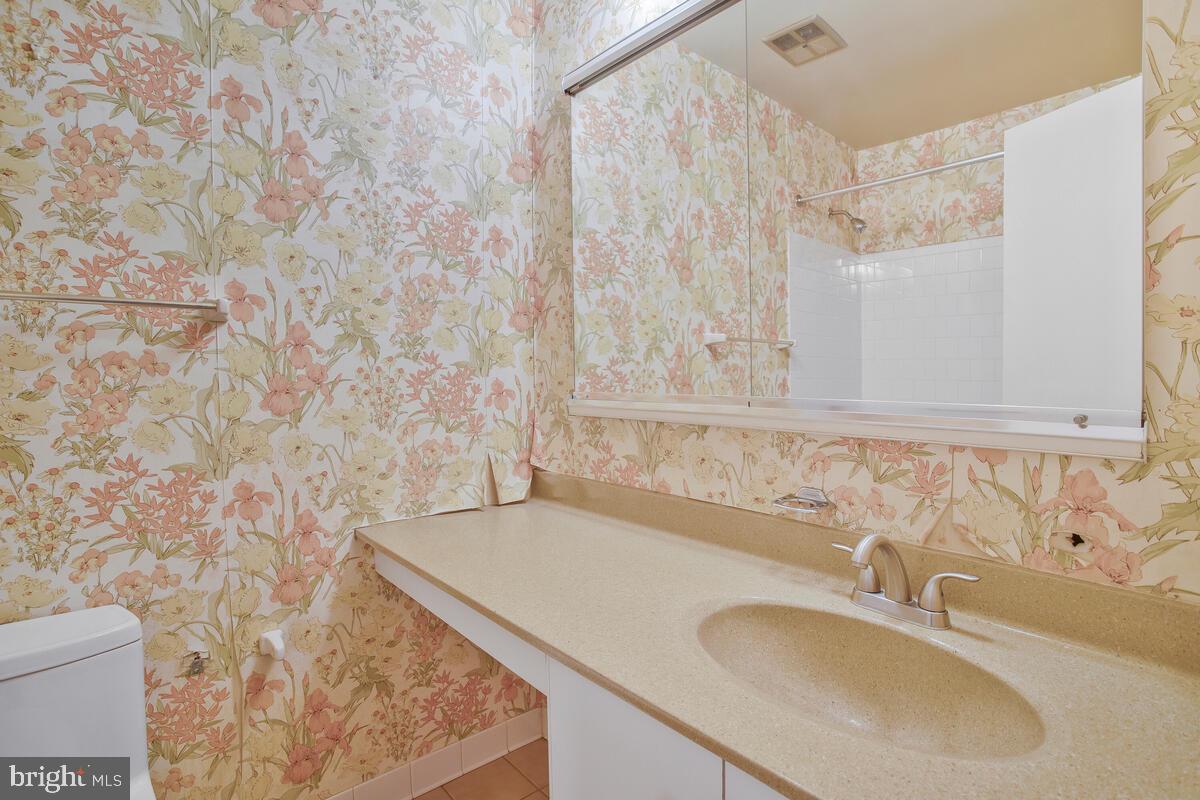 9930 Tuscarora Road Randallstown, MD 21133 - Photo 20 of 35 Hallway bathroom