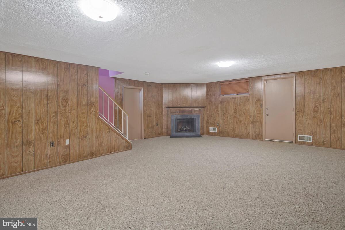 9930 Tuscarora Road Randallstown, MD 21133 - Photo 24 of 35 Gas fireplace in the family room
