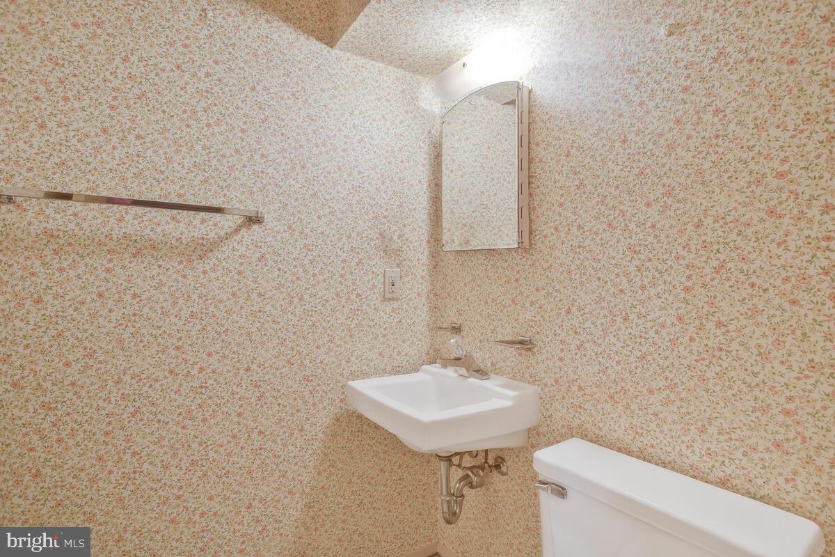 9930 Tuscarora Road Randallstown, MD 21133 - Photo 25 of 35 Half bathroom in basement