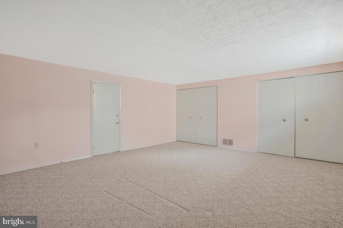 9930 Tuscarora Road Randallstown, MD 21133 - Photo 27 of 35 Wall of closets for storage