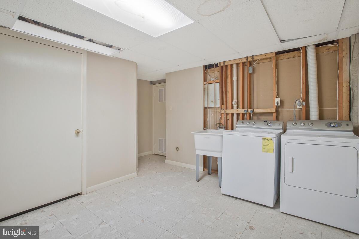 9930 Tuscarora Road Randallstown, MD 21133 - Photo 28 of 35 Laundry room and storage