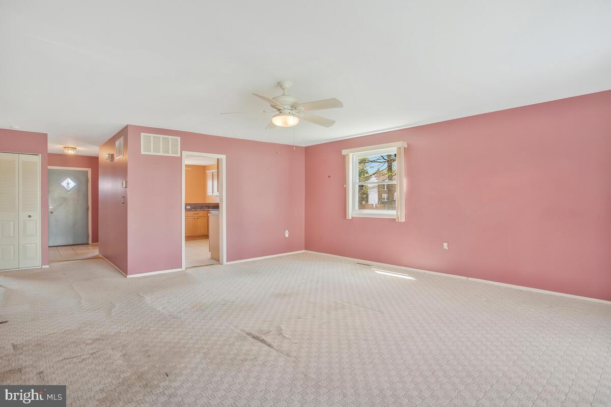 9930 Tuscarora Road Randallstown, MD 21133 - Photo 9 of 35 Spacious and sunny living room