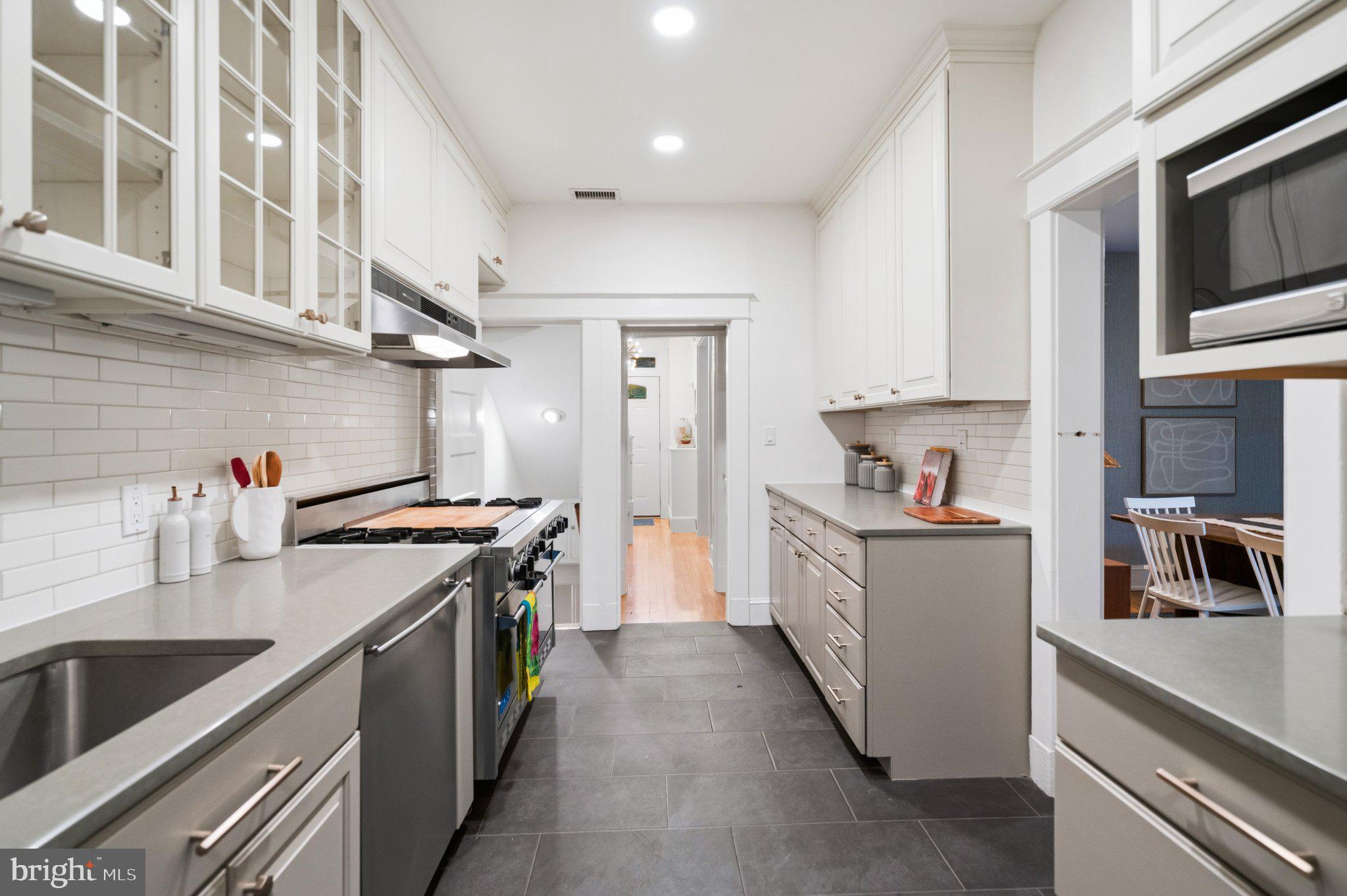 2934 Porter Street Northwest Washington, DC 20008 - Photo 8 of 33 Sleek modern kitchen with stylish finishes.