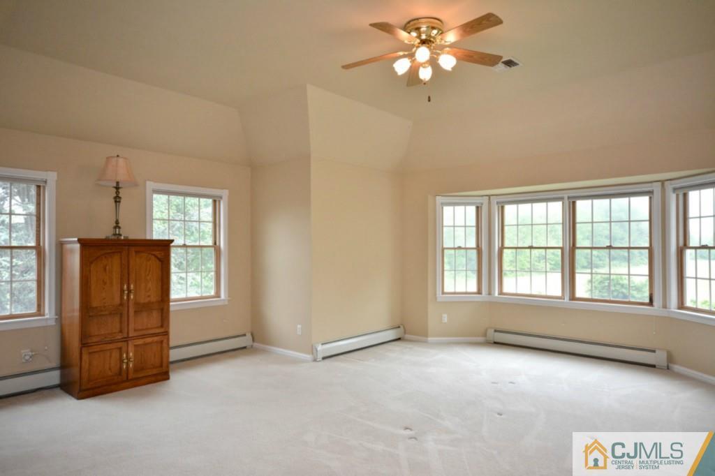 135 Dey Road Cranbury, NJ 08512 - Photo 14 of 25 a view of an empty room with a window