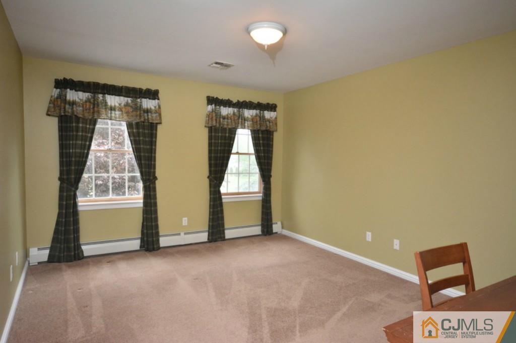 135 Dey Road Cranbury, NJ 08512 - Photo 18 of 25 an empty room with windows