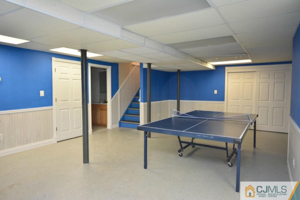 135 Dey Road Cranbury, NJ 08512 - Photo 20 of 25 a room with furniture and window