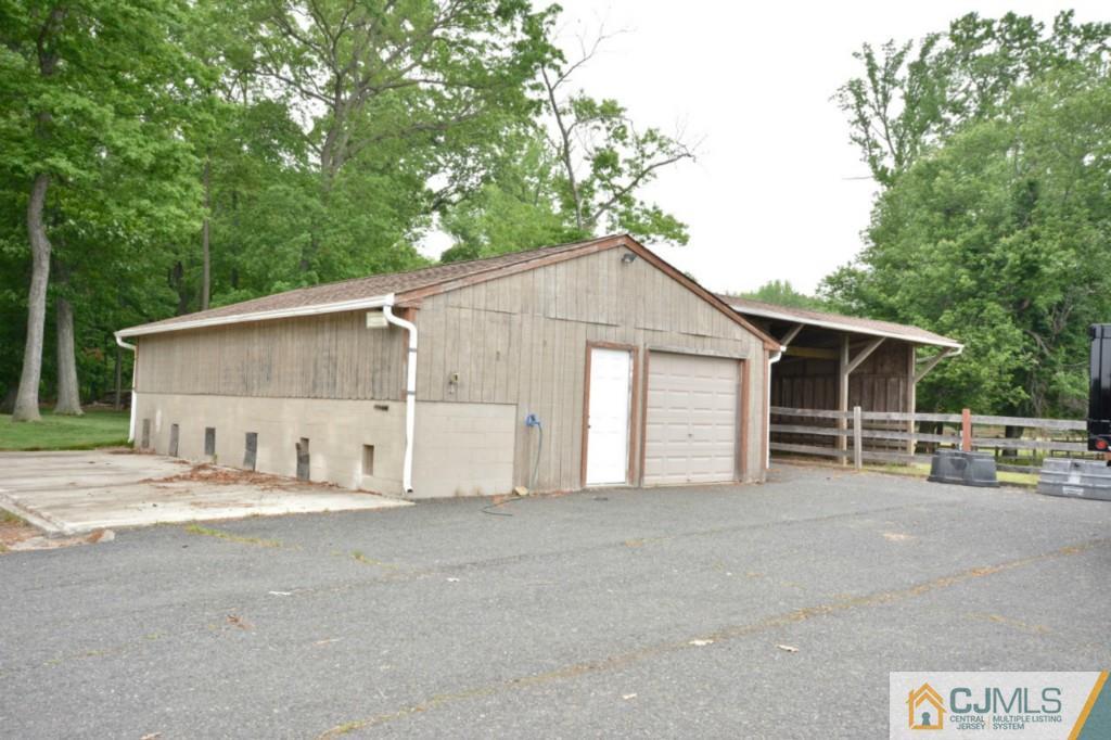 135 Dey Road Cranbury, NJ 08512 - Photo 23 of 25 a view of a house with a outdoor space and shower