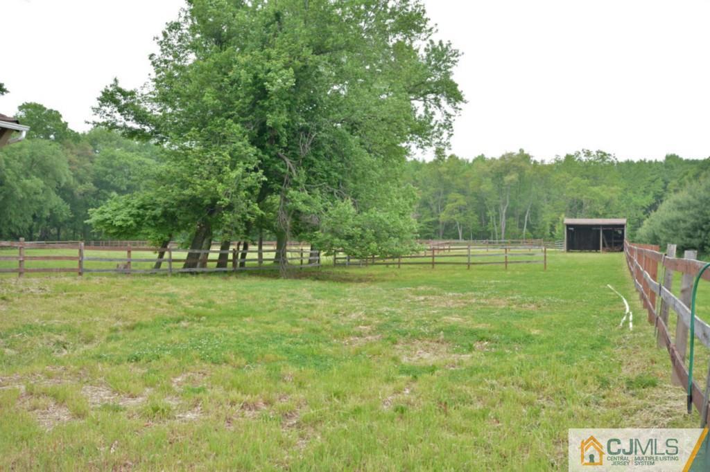 135 Dey Road Cranbury, NJ 08512 - Photo 24 of 25 a view of a park with large trees