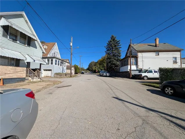 a view of street with cars
