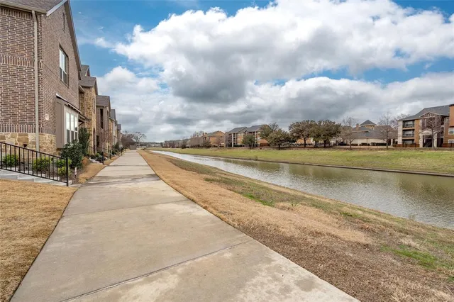 a view of a swimming pool with a porch