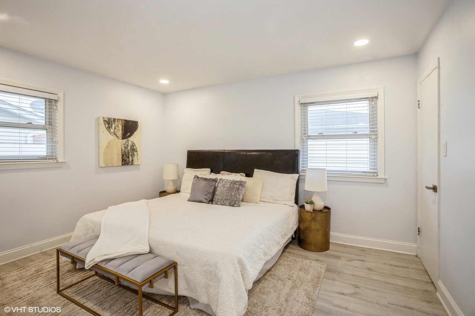 943 Maple Lane Elk Grove Village, IL 60007 - Photo 11 of 17 a bedroom with a bed and chair