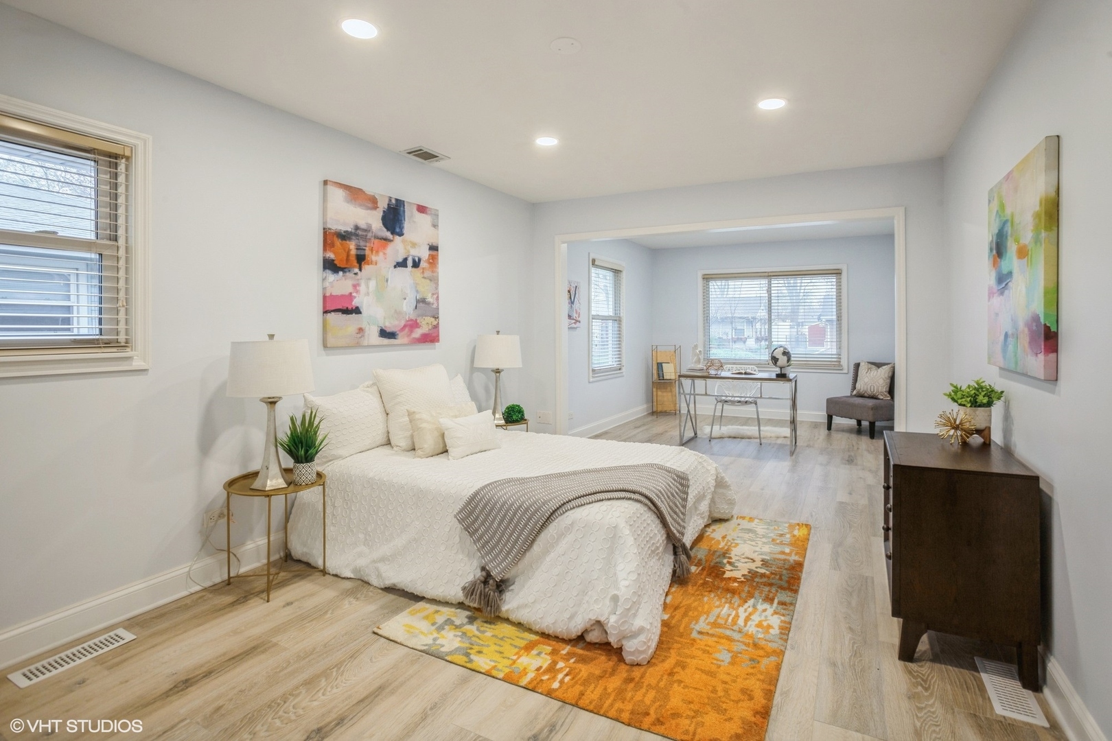 943 Maple Lane Elk Grove Village, IL 60007 - Photo 14 of 17 a bedroom with a bed and wooden floor